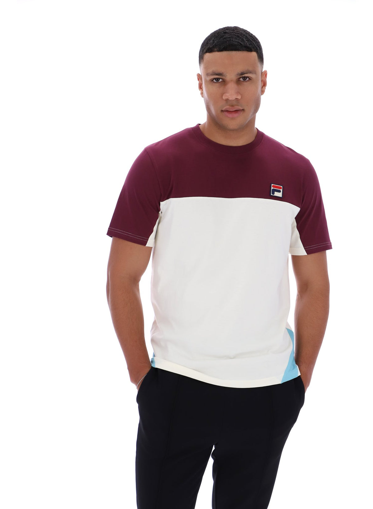Displays a model wearing Fig Tiebreaker 'FILA' branded Colour Block T-Shirt