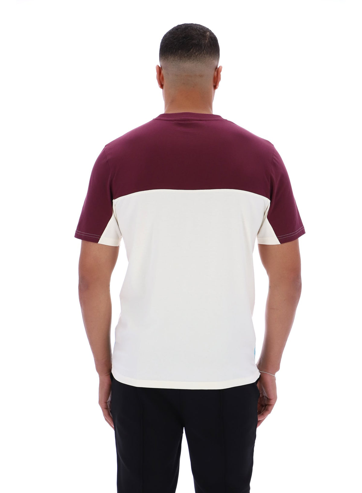 Displays a model wearing Fig Tiebreaker 'FILA' branded Colour Block T-Shirt