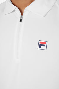 White short sleeve tennis polo with a collar, a zip-up shirt, and a FILA logo on the chest.