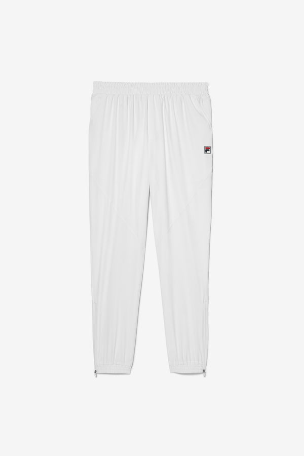 White tennis court track pants with the FILA logo on the left leg.
