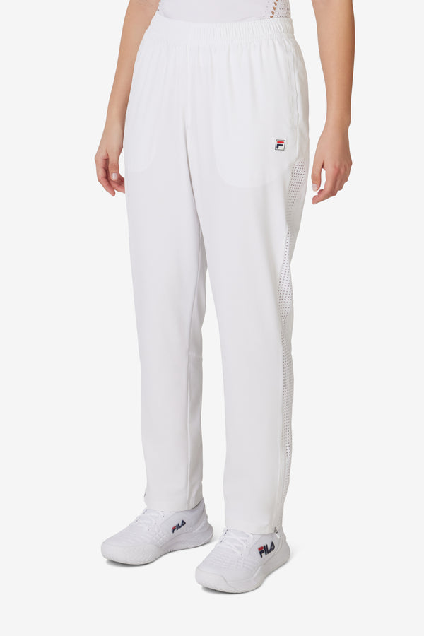 Displays a model wearing the White 'FILA' branded Tennis Advantage Track Pant