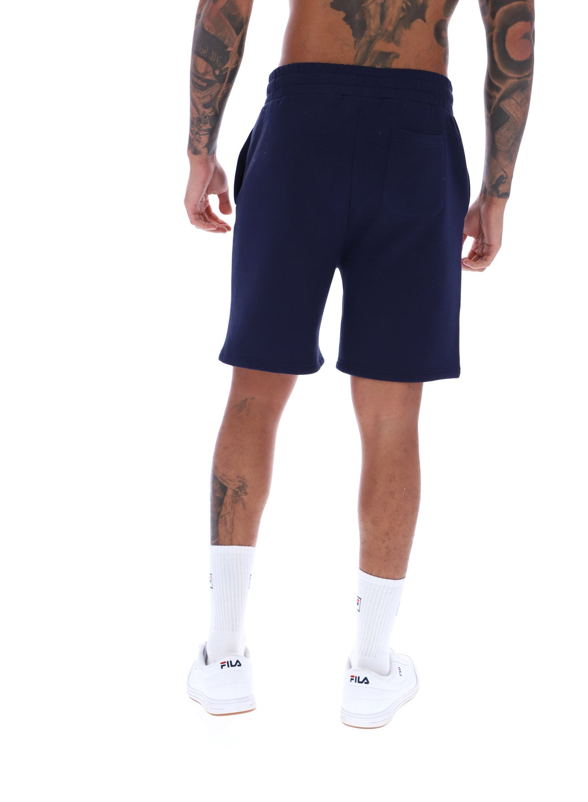 Displays a model wearing the Navy 'FILA' branded Vico Fleece Short