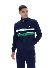 Displays a model wearing the Navy 'FILA' Vinnie Track Top