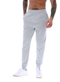 Displays a model wearing the Grey Marl 'FILA' branded Visconti Tipped Cuff Track Pant