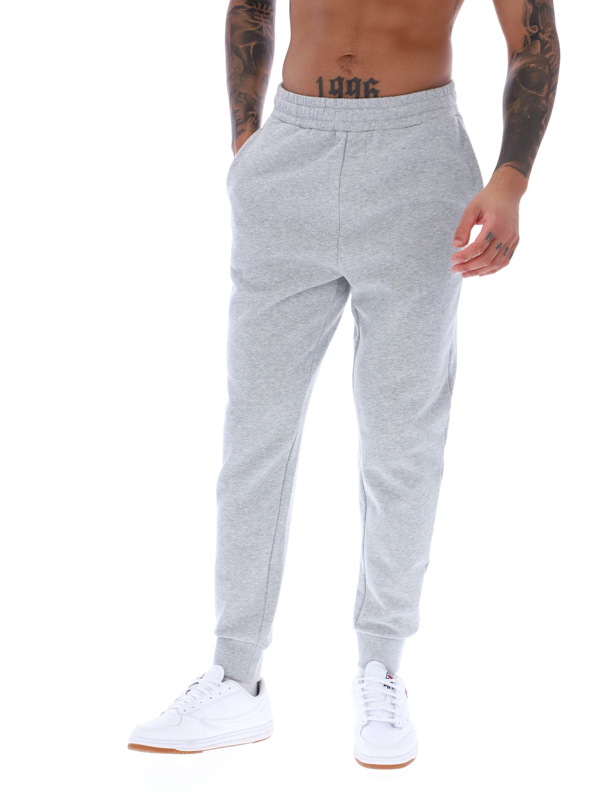 Displays a model wearing the Grey Marl 'FILA' branded Visconti Tipped Cuff Track Pant