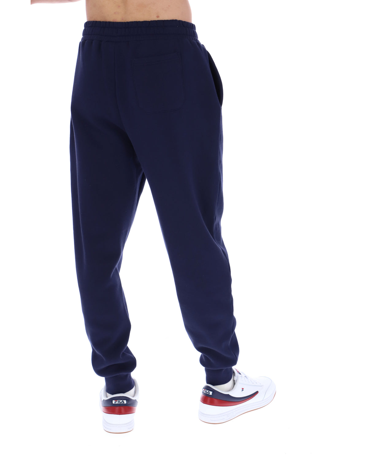 Displays the model wearing the Navy 'Fila' branded Visconti Tipped Cuff Track Pant