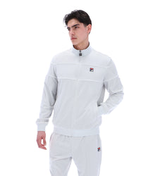 Displays a model wearing the Dawn Blue 'FILA' branded Vittorio Velour Track Top
