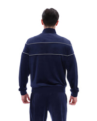 Displays a model wearing the Navy 'Fila' branded Vittorio Velour Track Top