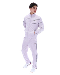 Displays a model wearing the Misty Lilac 'FILA' branded Vittorio Velour Track Top