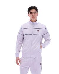 Displays a model wearing the Misty Lilac 'FILA' branded Vittorio Velour Track Top