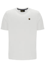 White t-shirt with a small FILA gold logo on a white background