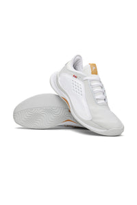 A pair of white FILA Mondo Forza tennis shoes with orange and grey accents on a white background.